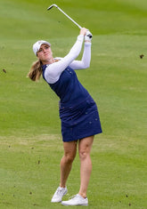 Woman playing golf in Sta-Cool UPF 50+ sports crop top