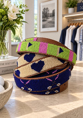 Sta-Cool beaded golf belts stacked, showing the flag, heart and diamond bead patterns