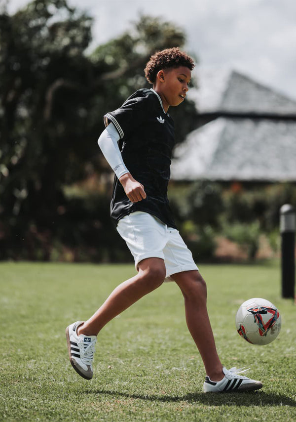 Sta-Cool kids' UPF 50+ sun sleeves and arm protection for outdoor sport